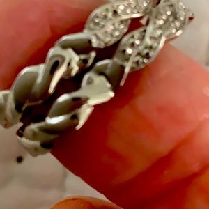 Very small silver hoop detailed earrings.